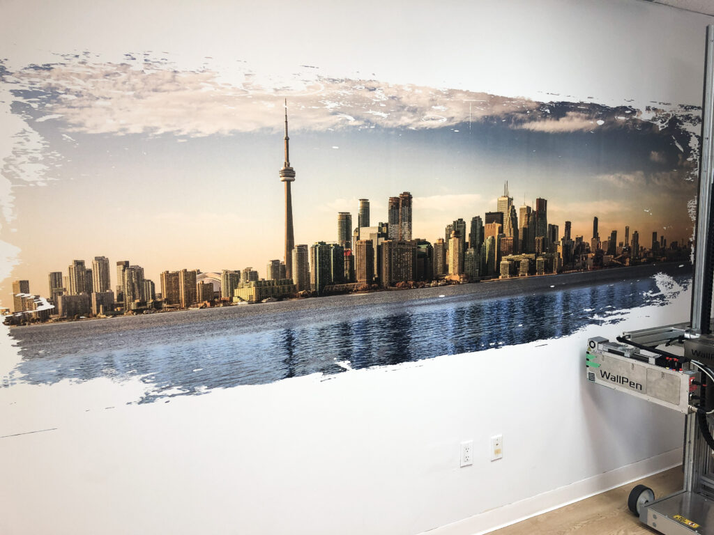 Image of a city skyline printed on dry wall.