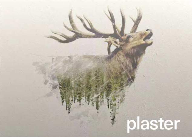 Image of an elk printed on plaster/dry wall with a vertical wall printer